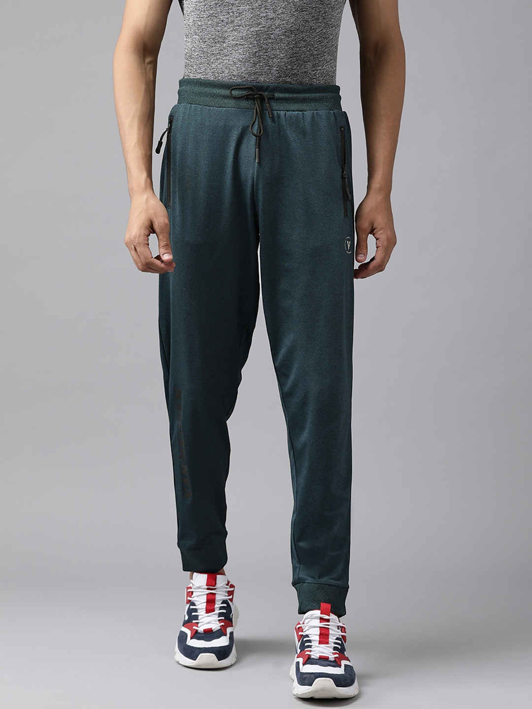 

Van Heusen Flex Men Teal Blue Solid Regular Fit Joggers
