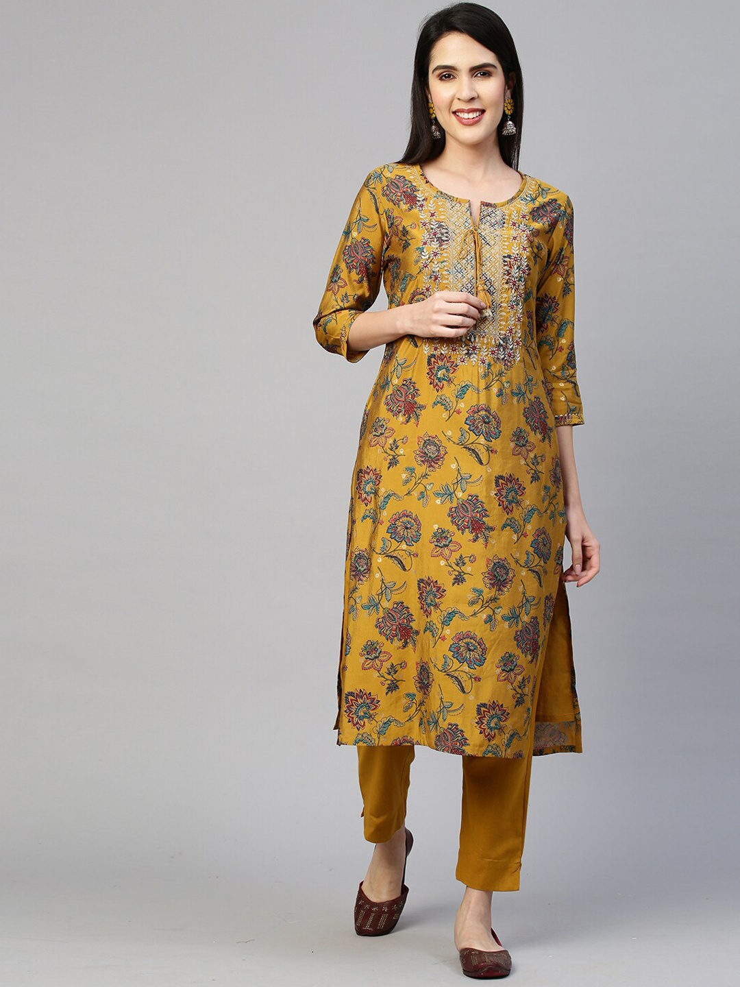 

FASHOR Women Mustard Yellow Ethnic Motifs Embroidered Thread Work Kurta with Trousers