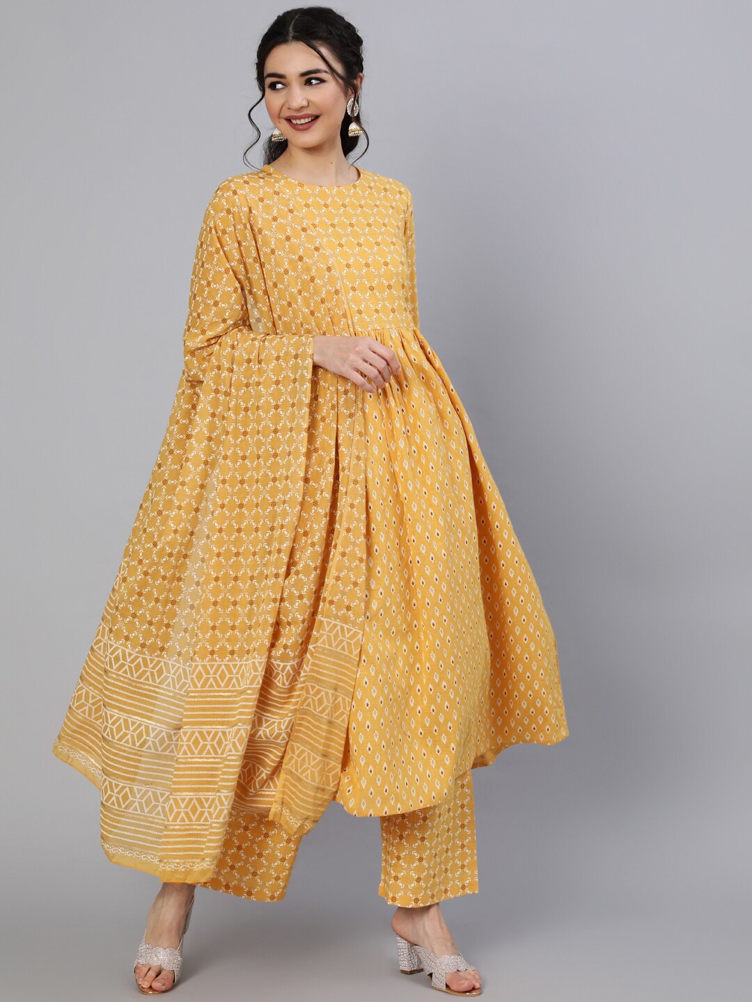 

Nayo Women Yellow Printed Cotton Flared Kurta with Trousers & With Dupatta