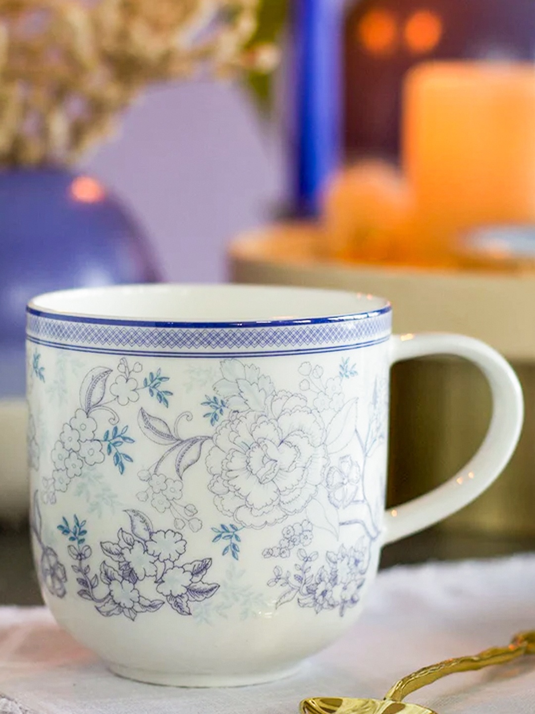 

The Wishing Chair White & Blue Floral Printed Bone China Glossy Mug