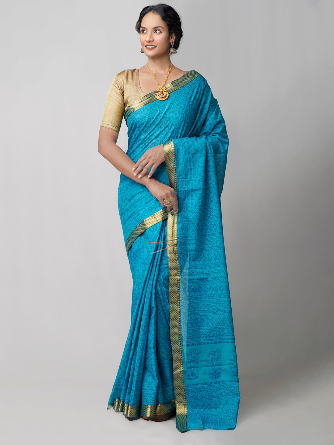 

Unnati Silks Blue & Golden Zari Pure Cotton Handloom Sustainable Block Print Saree