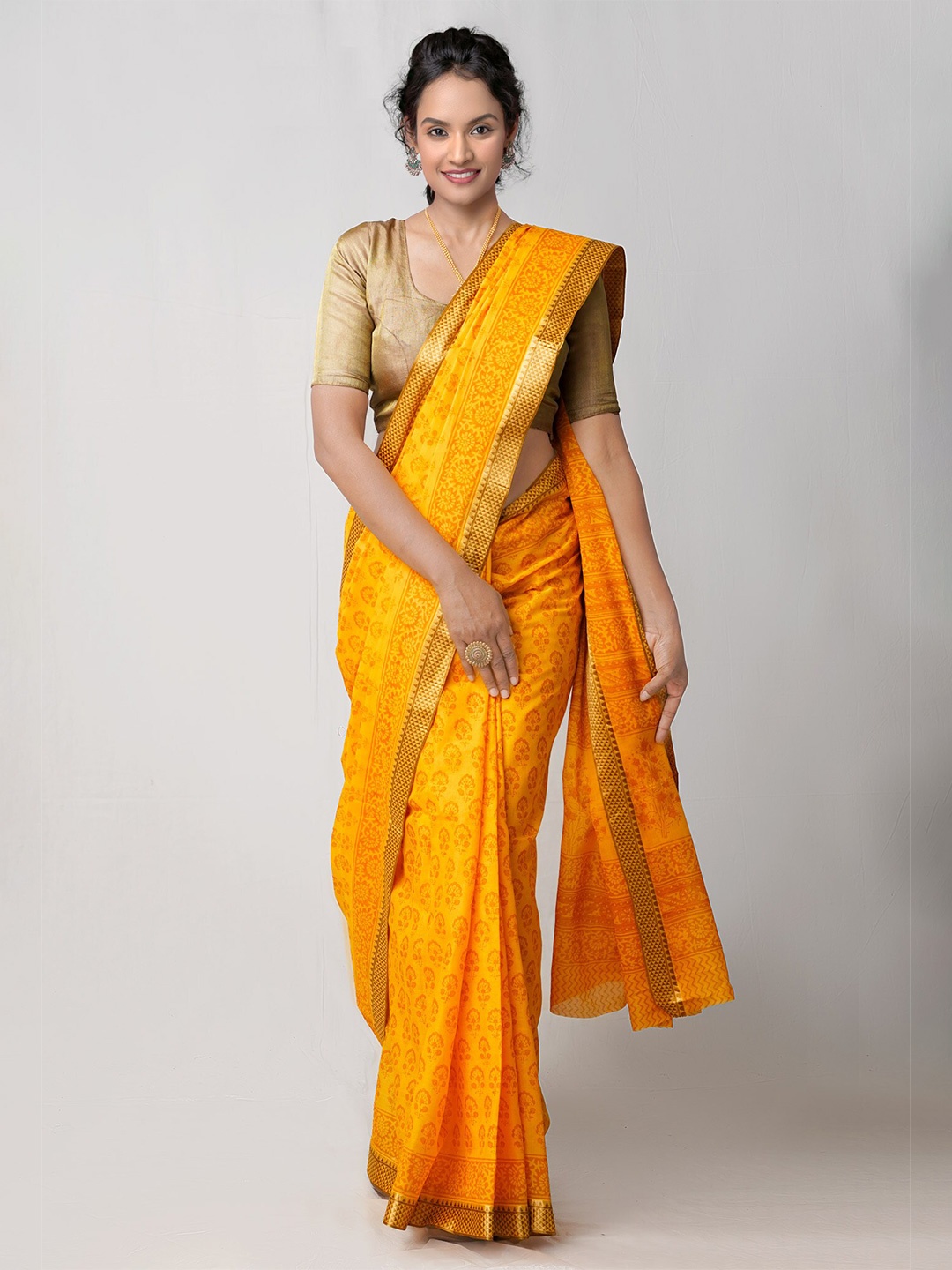 

Unnati Silks Yellow Ethnic Motifs Cotton Block Printed Saree