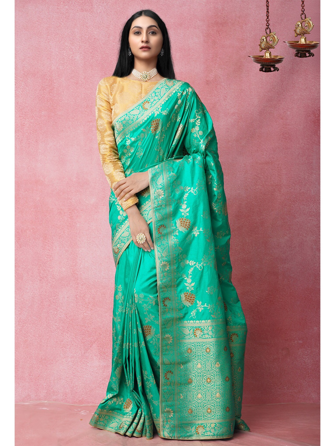 

Unnati Silks Green Floral Zari Silk Blend Banarasi Saree