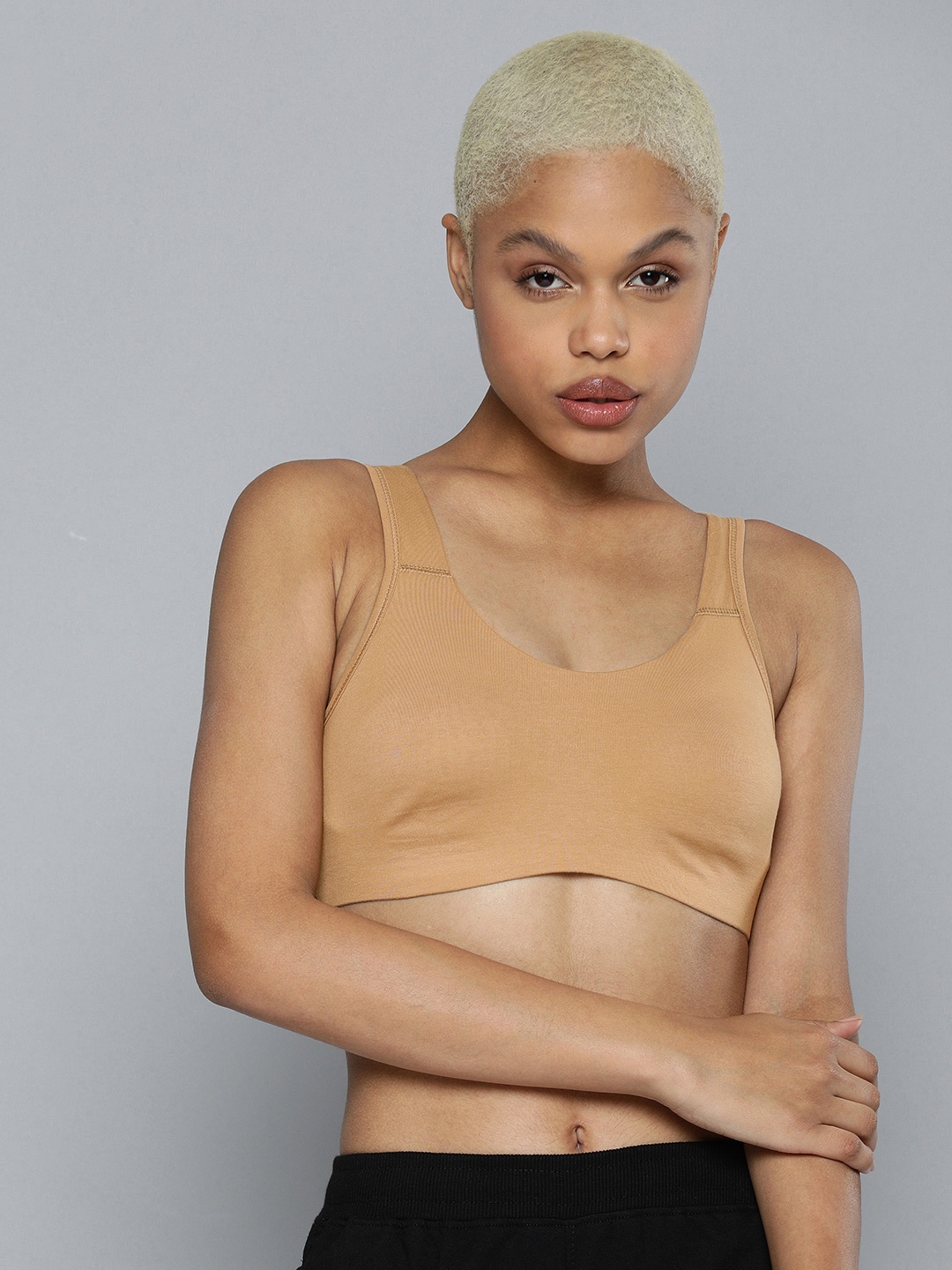 

HRX By Hrithik Roshan Women Non Padded Non-Wired Low impact Beige Solid Sports Bra