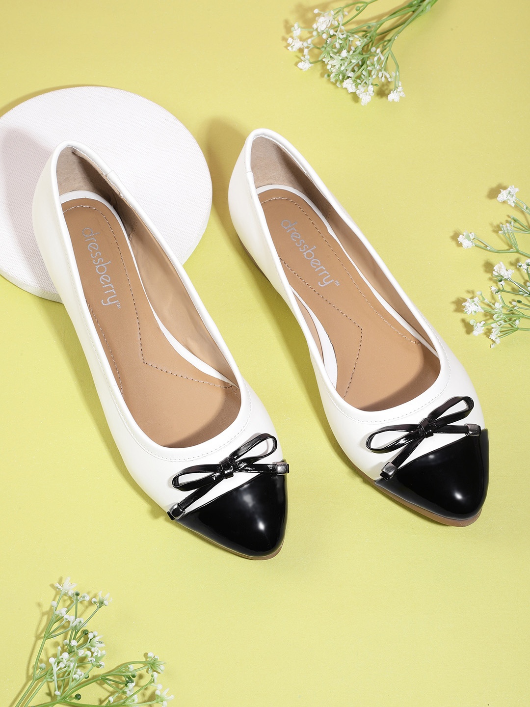 

DressBerry Women White & Black Colourblocked Ballerinas with Bow Upper