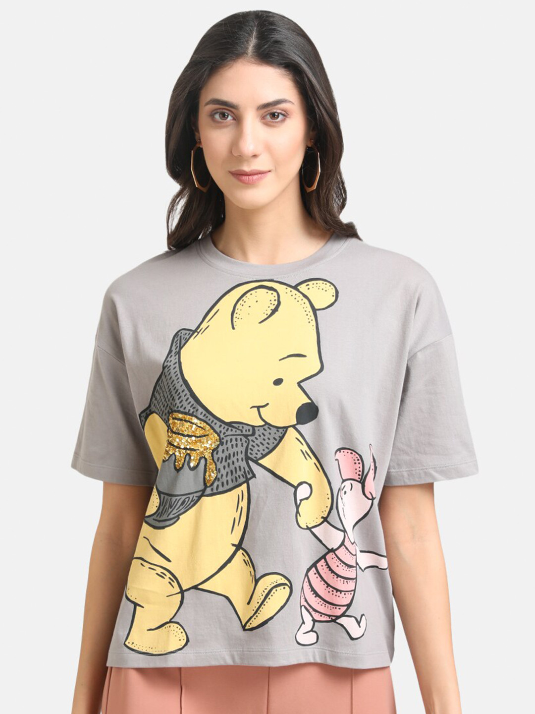 

Kazo Women Grey & Yellow Winnie The Pooh Printed Loose T-shirt With Gold Sequin Work