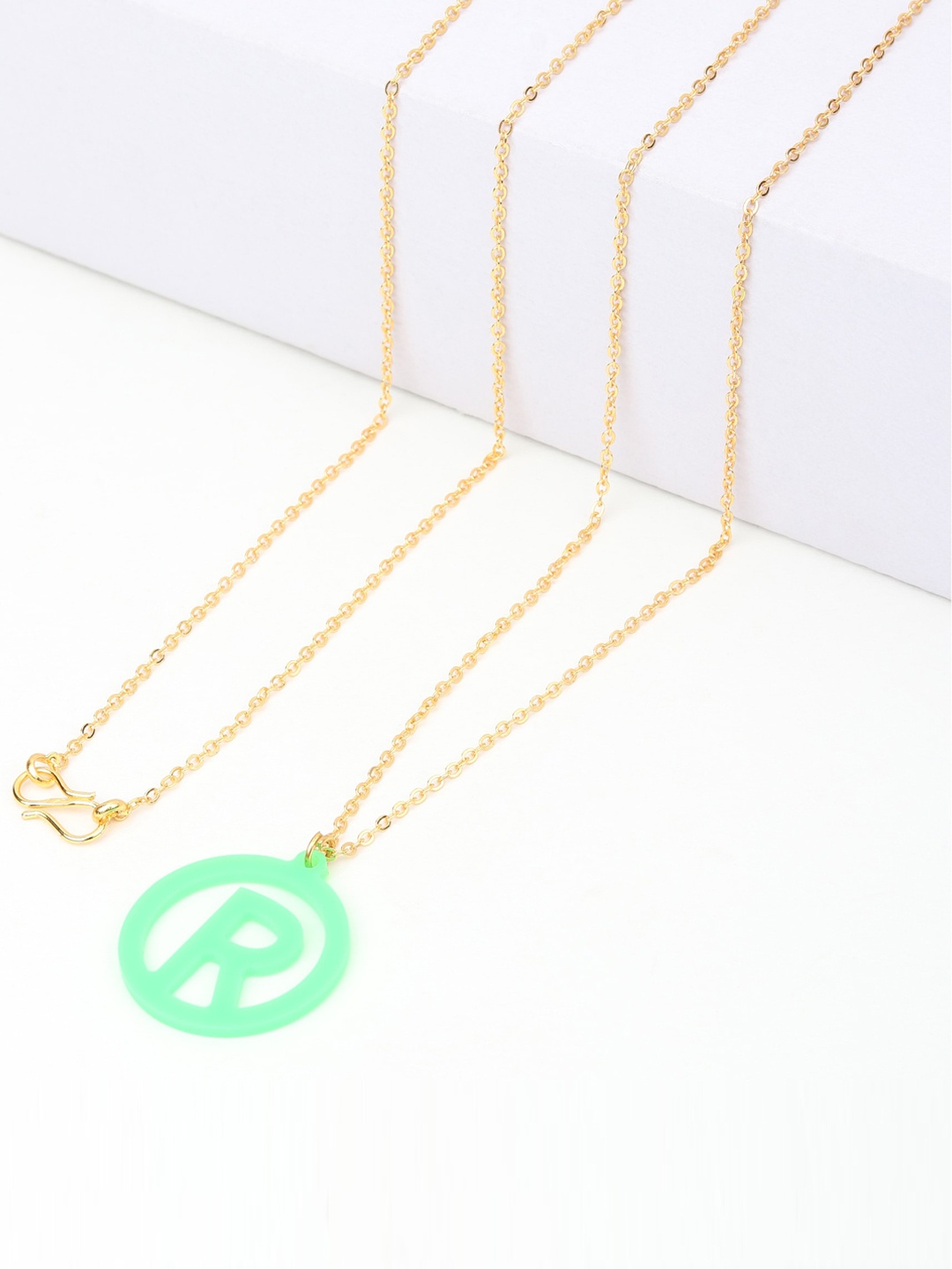 

Goldnera Green Letter R Pendant with Chain