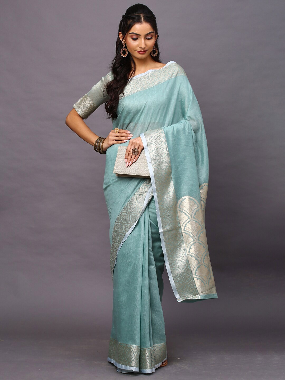 

Mitera Sea Green Floral Linen Blend Taant Saree