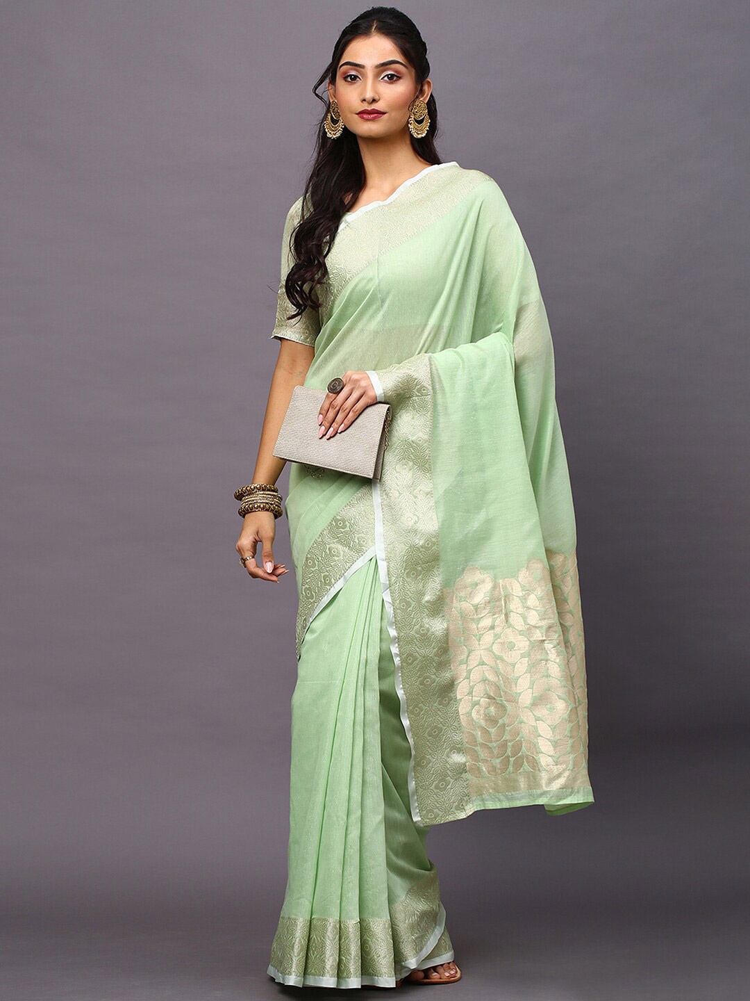 

Mitera Mint Green & Golden Ethnic Motifs Zari Linen Blend Taant Saree