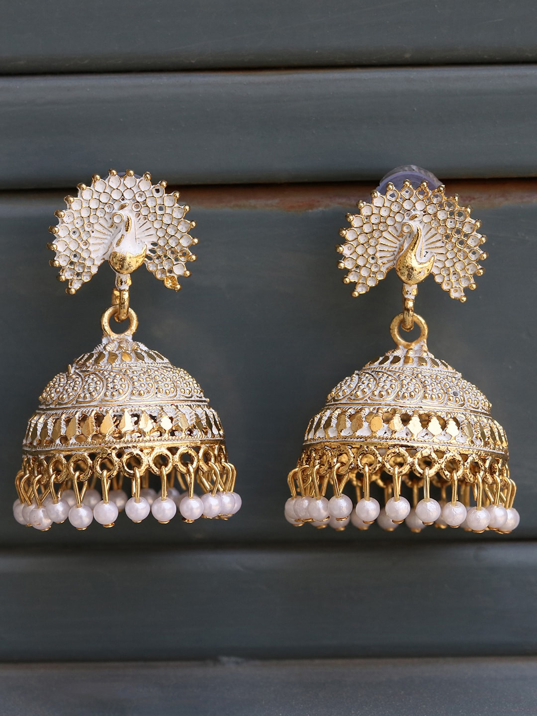 

ANIKAS CREATION Gold-Plated White Enamelled Contemporary Jhumkas Earrings