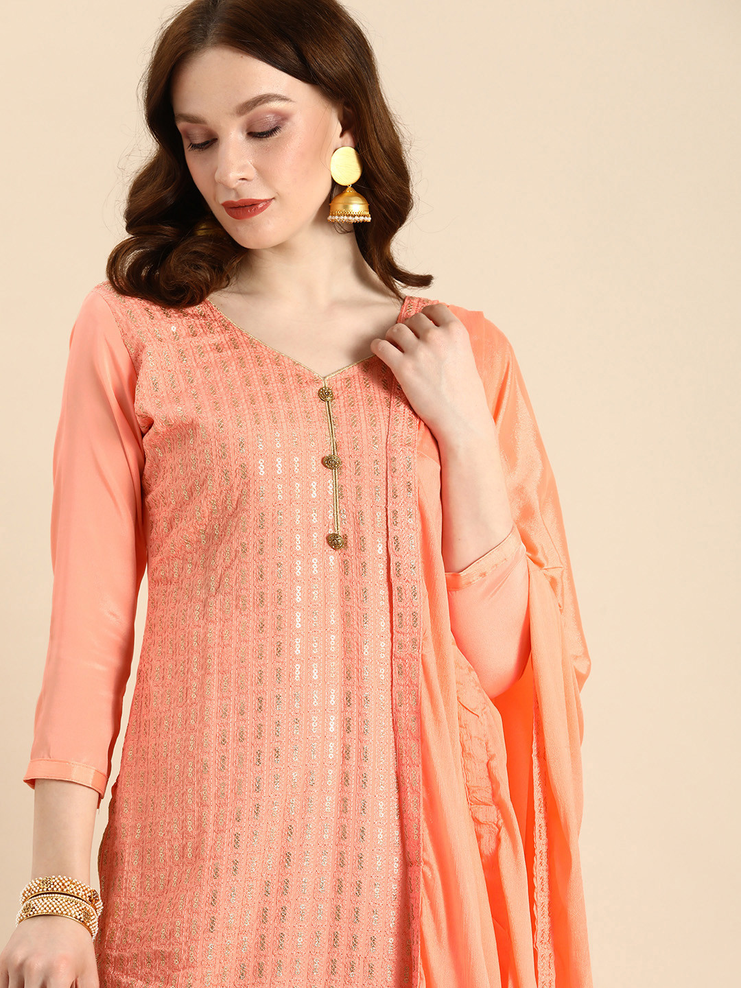 

Shaily Peach-Coloured & Golden Embroidered Unstitched Dress Material