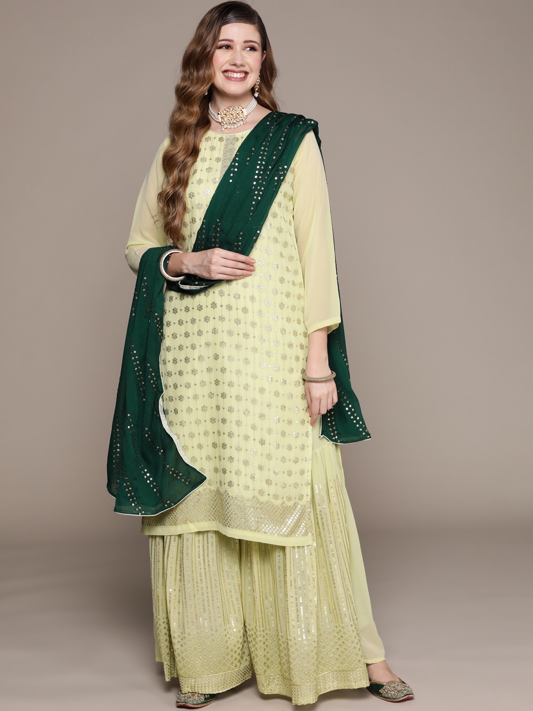 

Ishin Women Green Ethnic Motifs Embroidered Sequinned Kurta with Sharara & With Dupatta