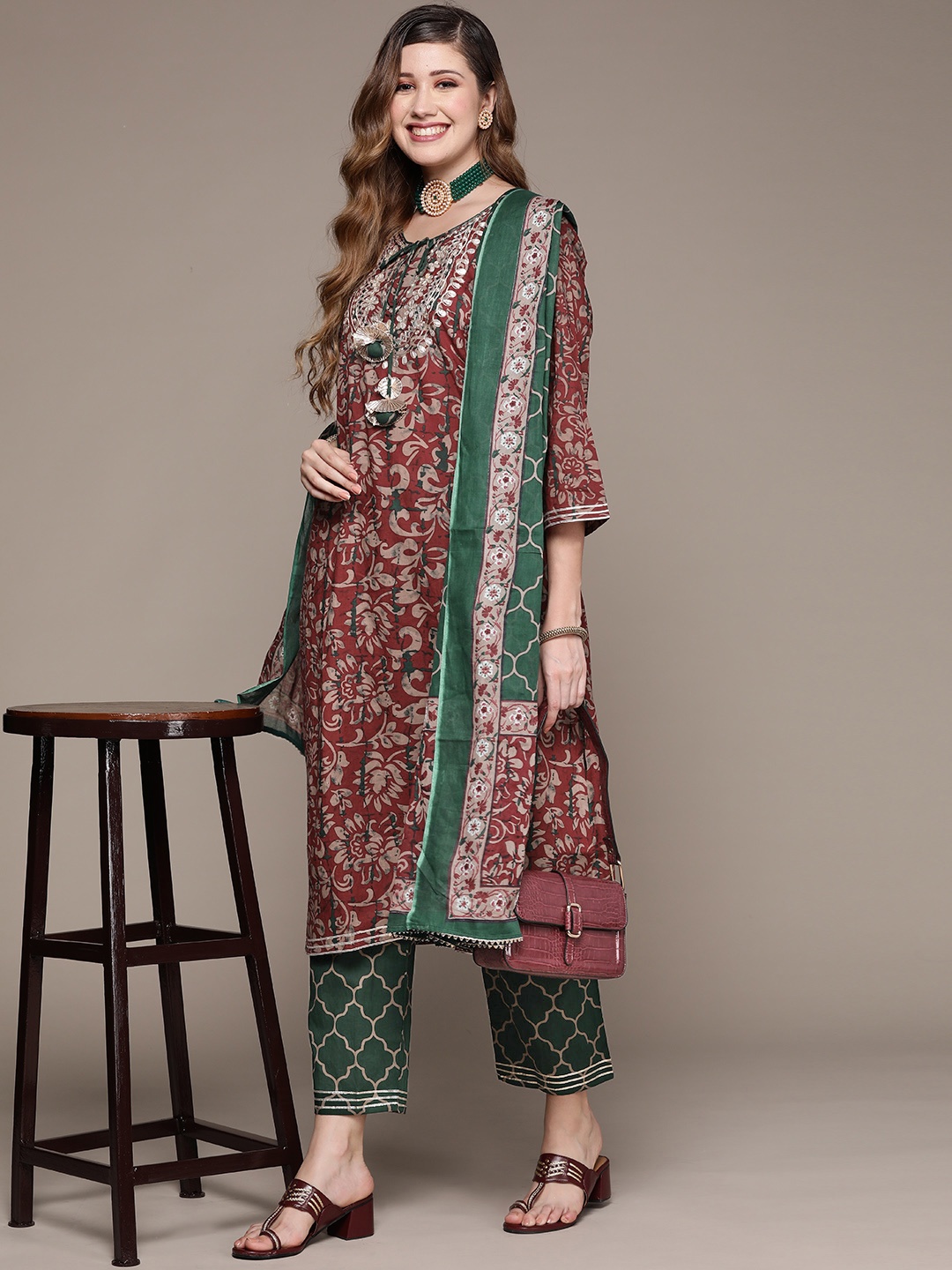 

Ishin Women Maroon & Green Ethnic Motifs Embroidered Kurta with Trousers & Dupatta