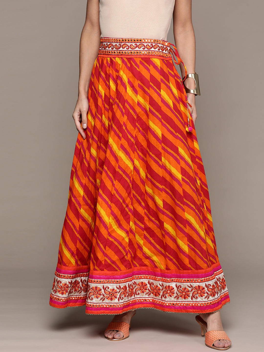 

Ishin Women Orange & Yellow Tie & Dye Embroidered Detail Flared Maxi Skirt