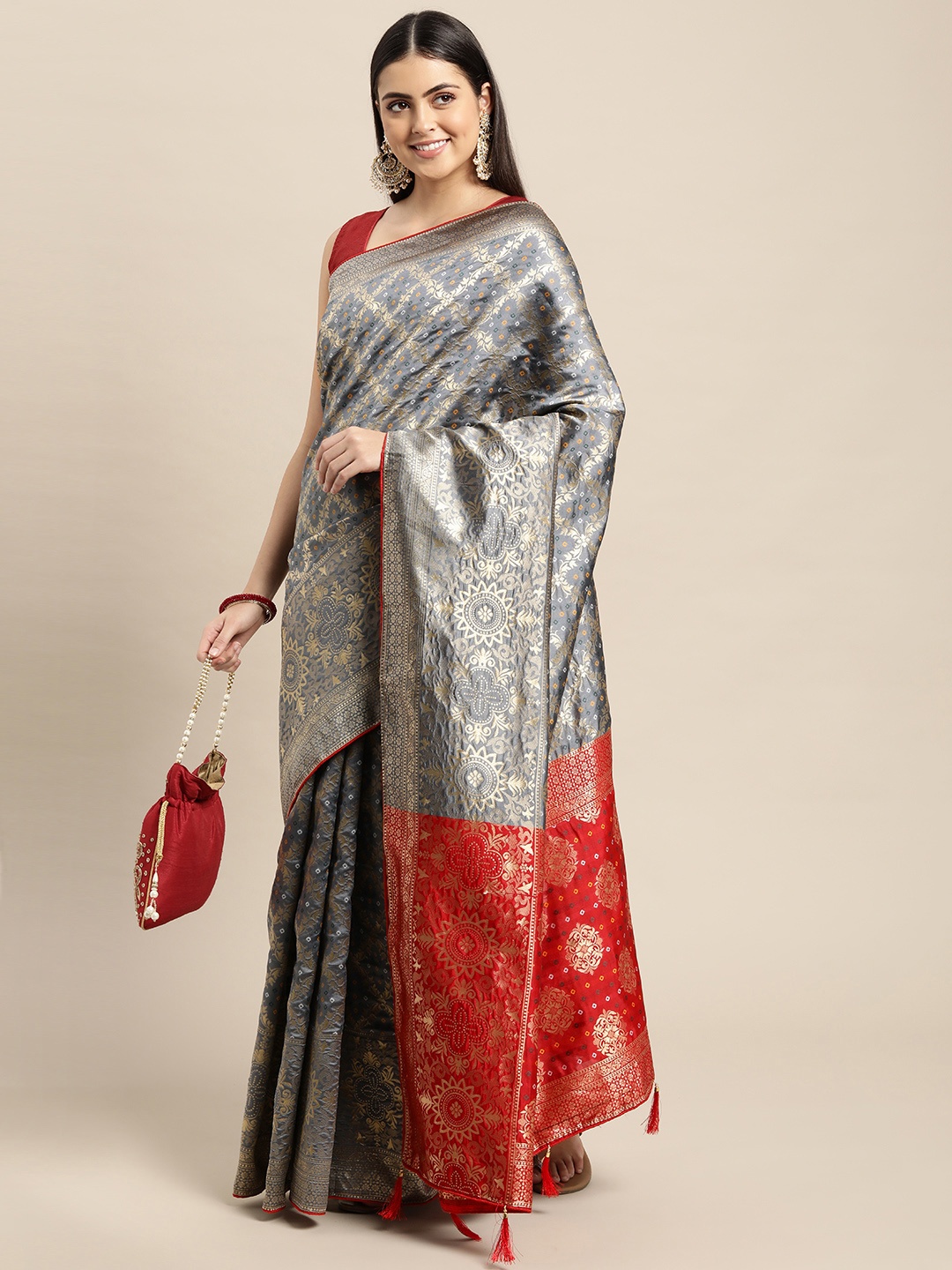 

Leeza Store Grey & Golden Ethnic Motifs Zari Bandhani Saree