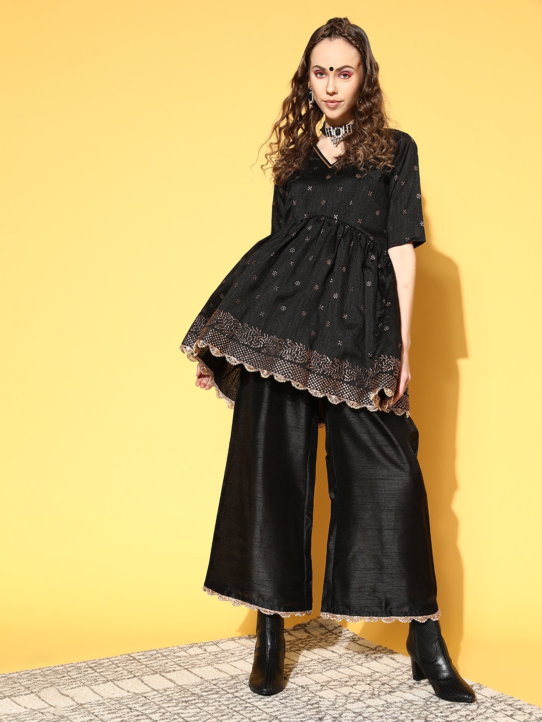 

Ahalyaa Women Black & Golden Ethnic Motifs Printed Empire Gotta Patti Kurti with Palazzos