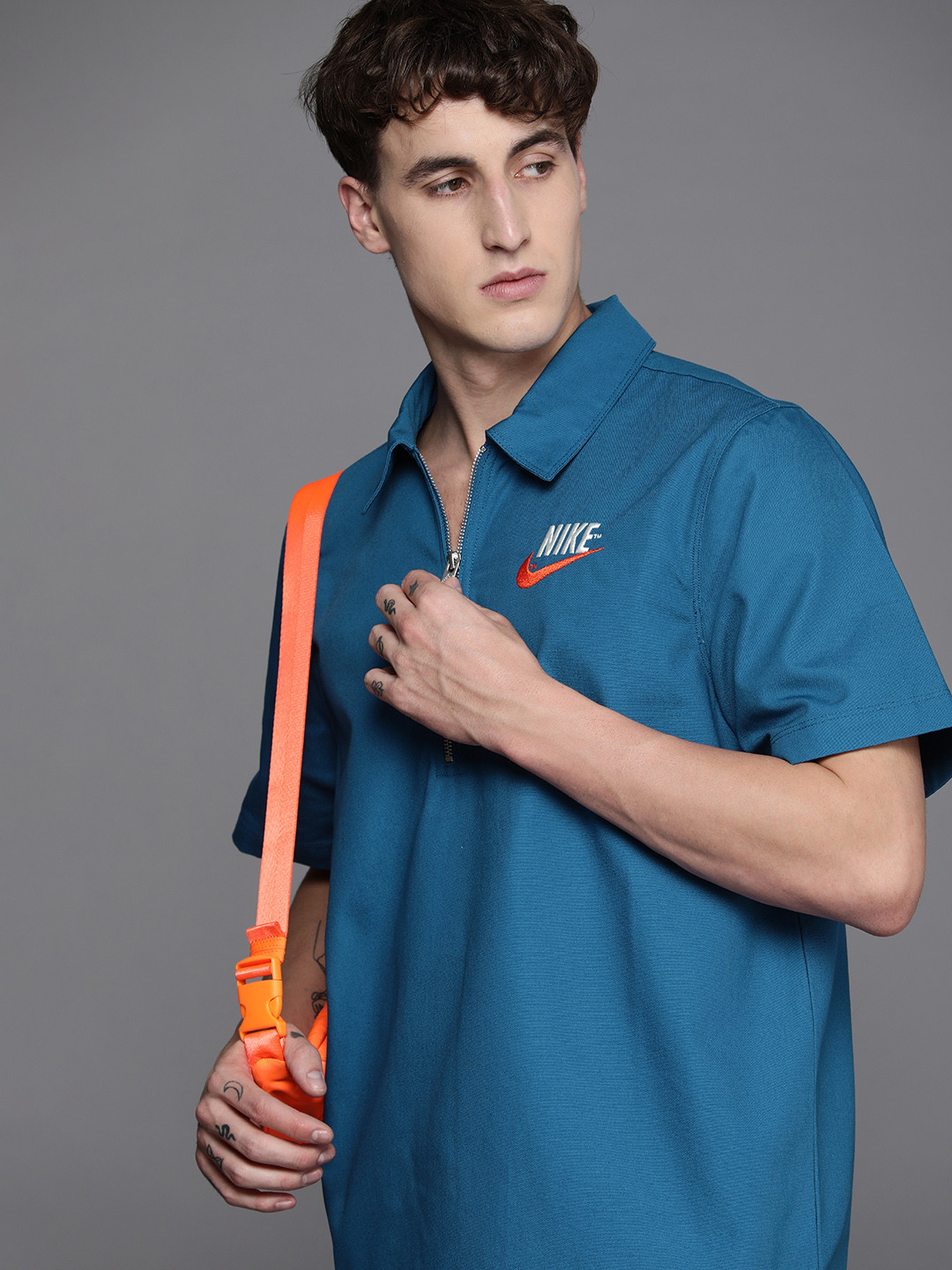 

Nike Men Blue Oversized Fit TREND Polo Collar Pure Cotton T-shirt