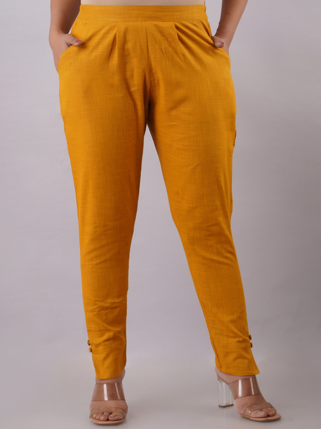 

Maishi Women Mustard Yellow Solid Slim Fit Pleated Cotton Slub Cigarette Trousers