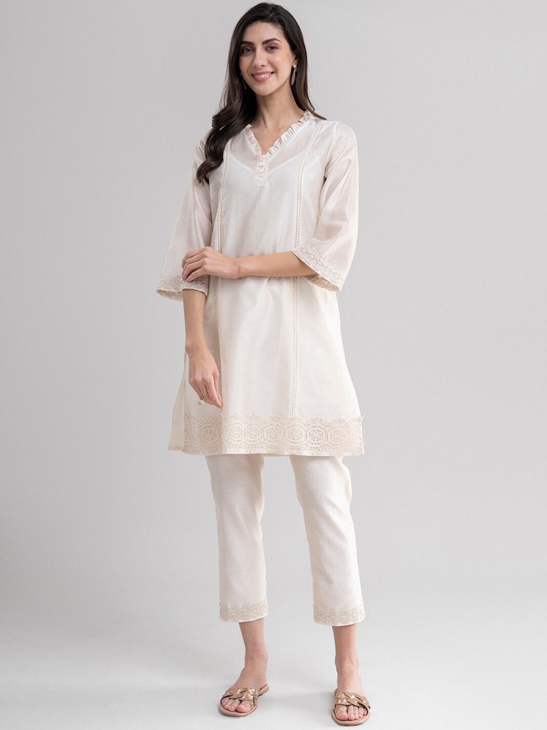 

Pink Fort Women Off White Panelled Kurta with Trousers