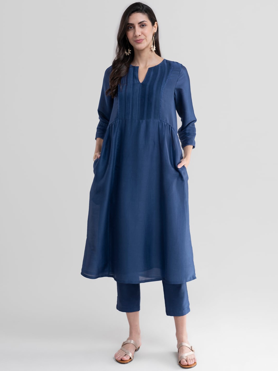 

Pink Fort Women Navy Blue Kurta with Trousers
