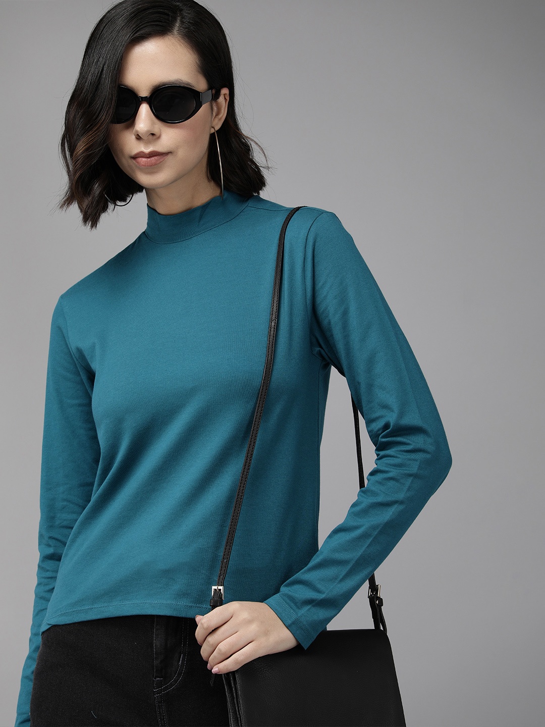 

Van Heusen Women Teal Blue Solid Round Neck Full Sleeves Casual Top