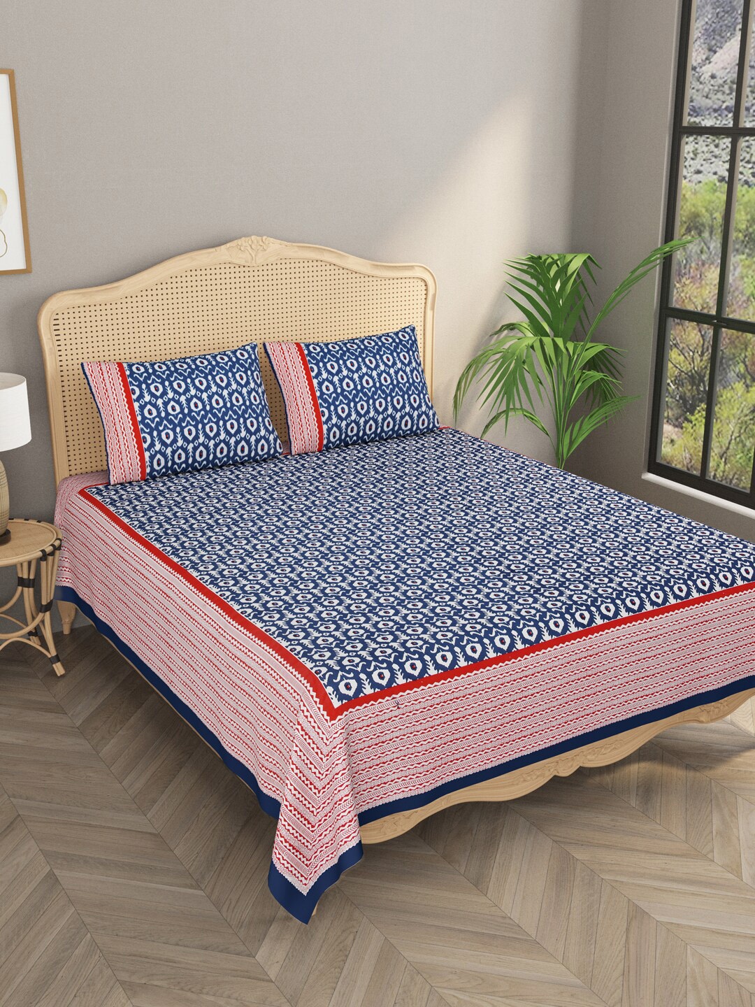 

Gulaab Jaipur Blue & Red 600 TC Ikat Printed Cotton King Bedsheet with 2 Pillow Covers