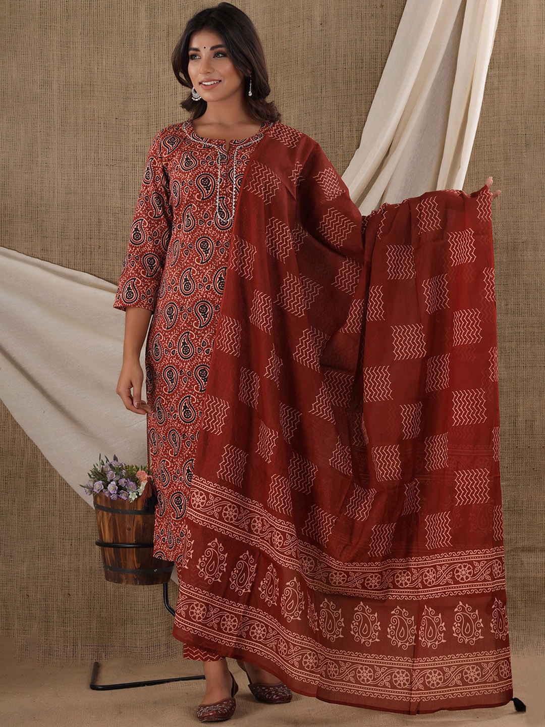 

KAAJH Women Rust Ethnic Motifs Printed Pure Cotton Kurta with Palazzos & With Dupatta