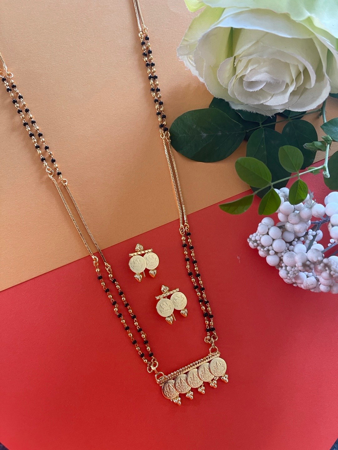 

Digital Dress Room Gold-Plated & Black Beaded Stone-Studded Mangalsutra With Earrings