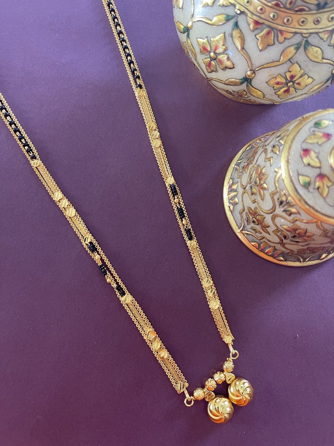 

Digital Dress Room Gold-Plated & Black Beaded Mangalsutra