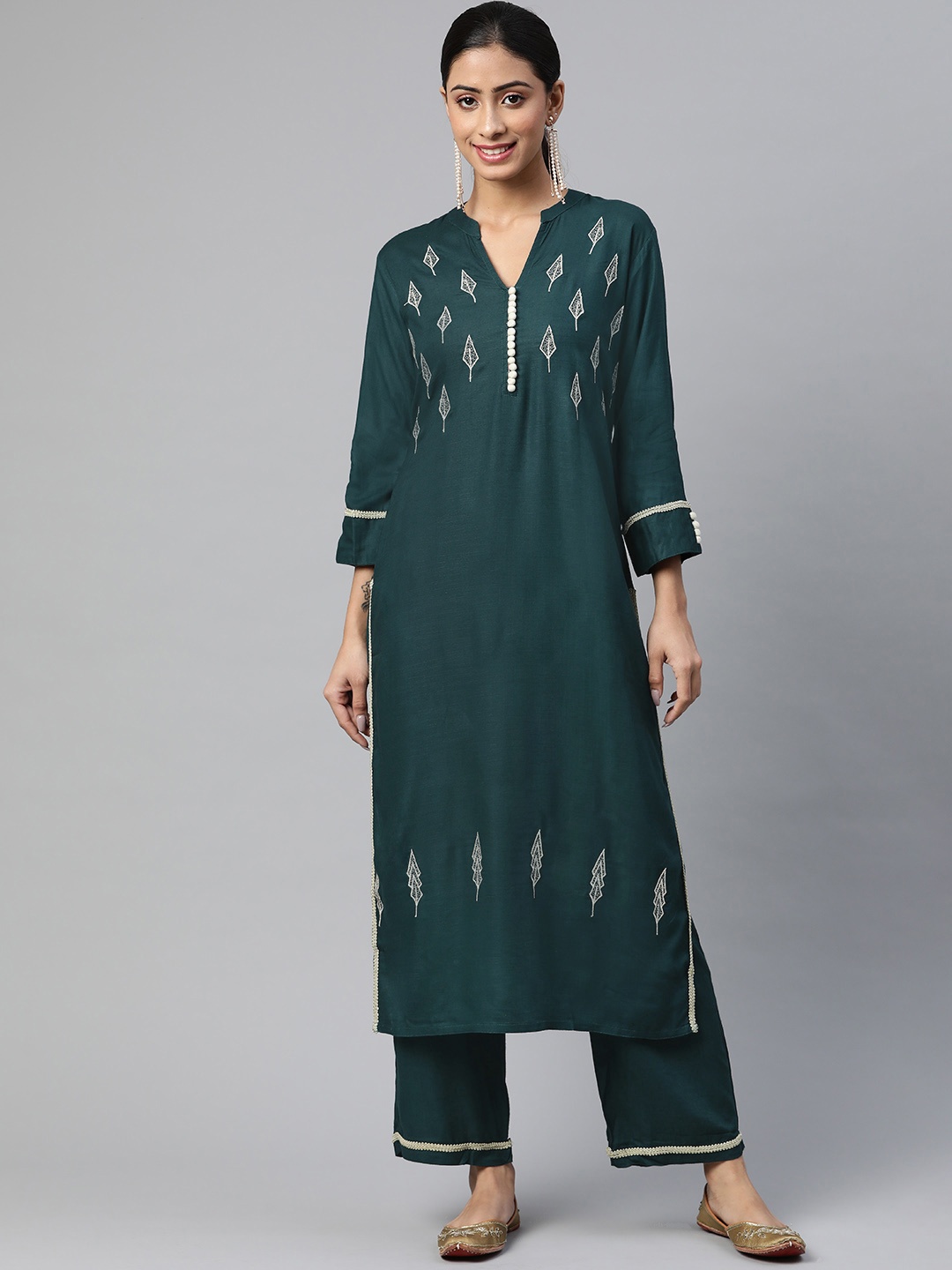 

SVARCHI Women Green Ethnic Motifs Embroidered Thread Work Kurta with Palazzos