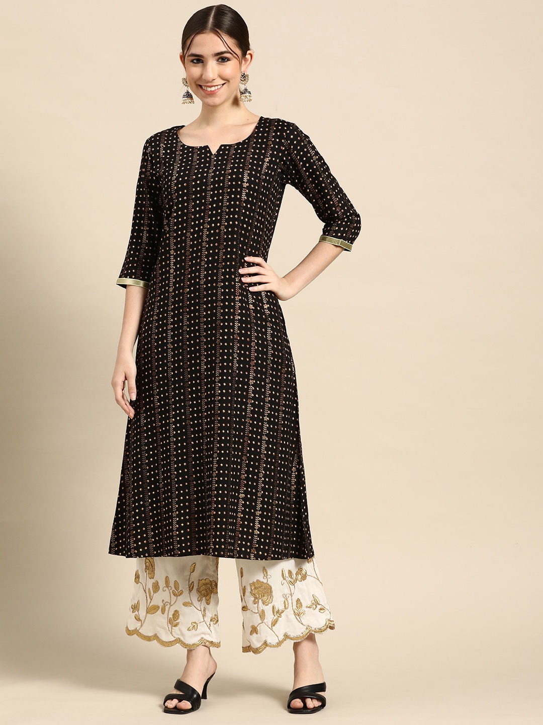 

Gerua By Libas Women Black Golden Striped Printed Kurta
