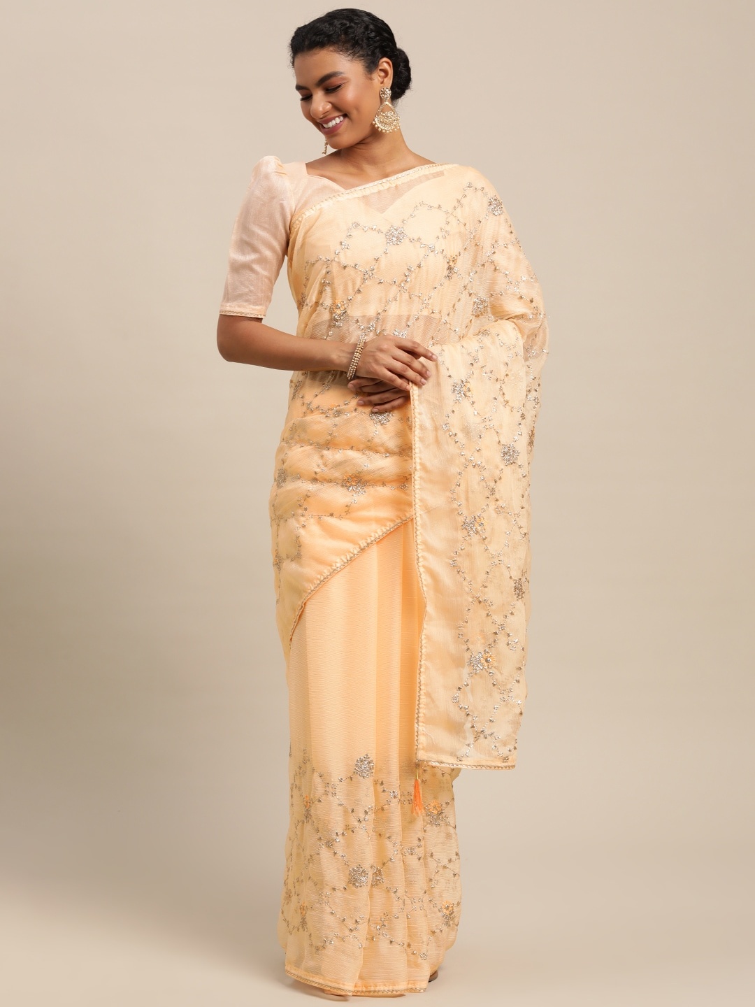 

Satrani Peach-Coloured & Golden Ethnic Motifs Embroidered Saree