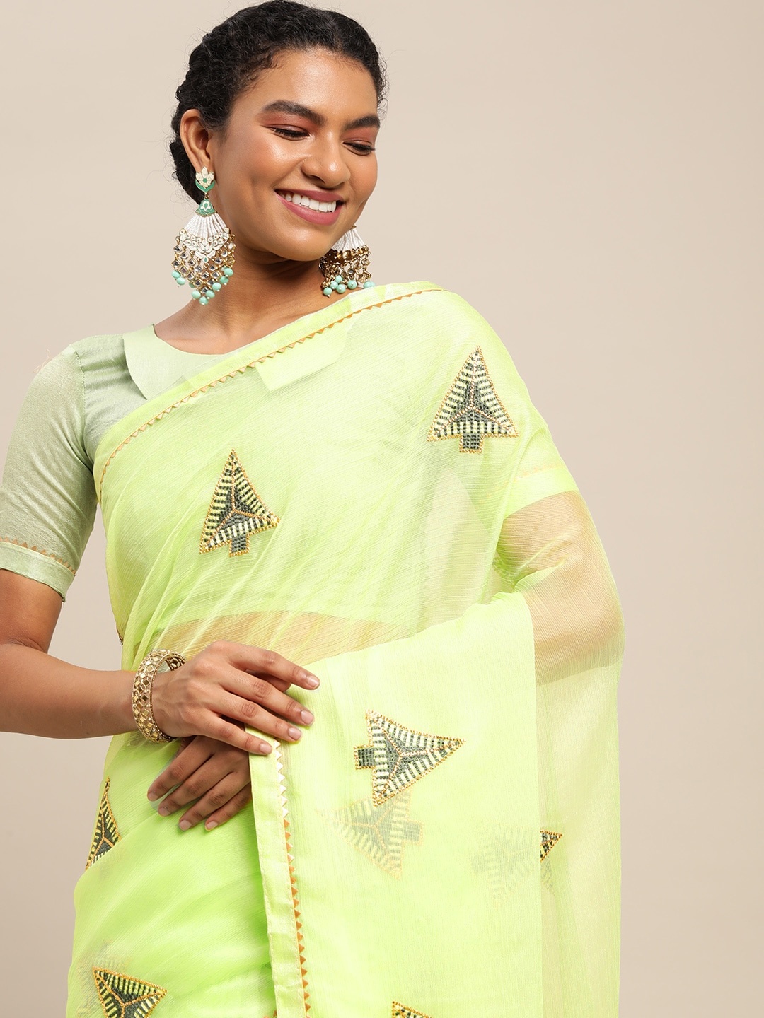 

Satrani Green Ethnic Motifs Embroidered Saree
