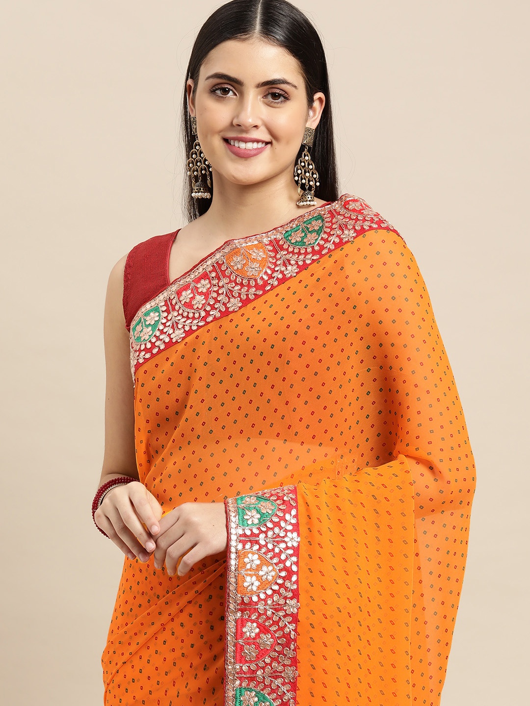 

Mitera Mustard & Red Bandhani Gotta Patti Pure Georgette Bandhani Saree