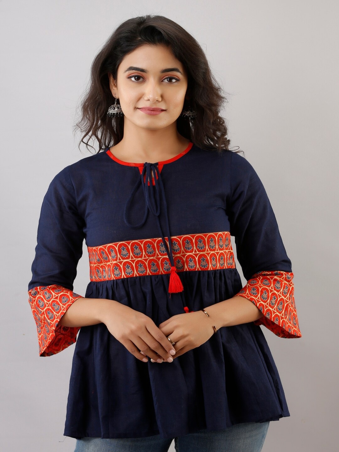 

Maishi Navy Blue & Red Printed Cotton Tie-Up Neck Empire Top