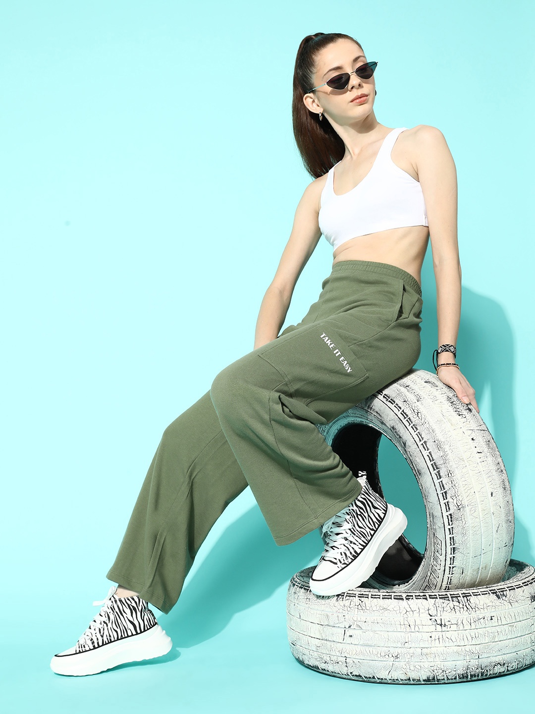 

The Roadster Lifestyle Co. Women Olive Green Stayin' in Style Wide Leg Track Pants