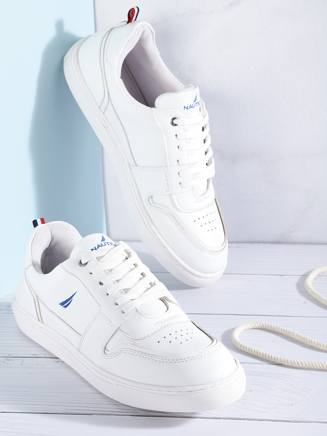 

Nautica Men White Solid Perforated Sneakers