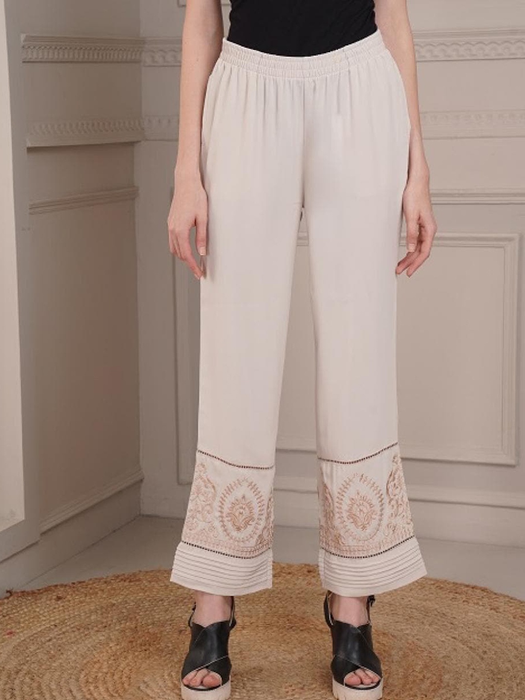 

Lakshita Women Beige Ethnic Motifs Hem Design Cotton Ethnic Palazzos