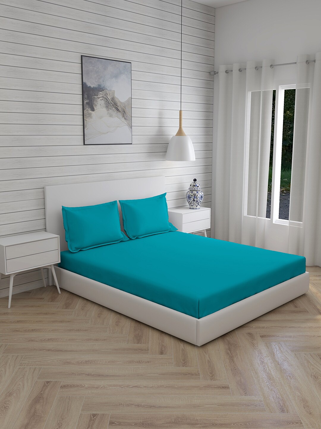 

Layers Blue Solid 144 TC Cotton King Bedsheet with 2 Pillow Covers