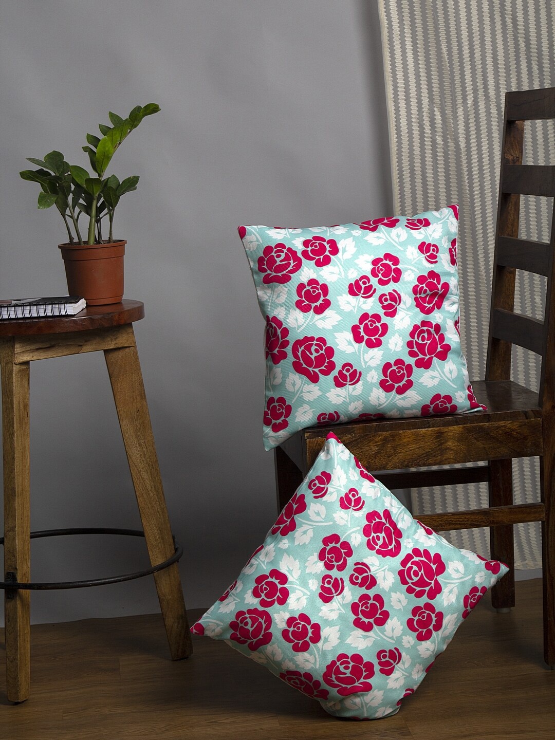 

Alina decor Blue & Fuchsia Floral Printed Square Cushion Covers Set of 2