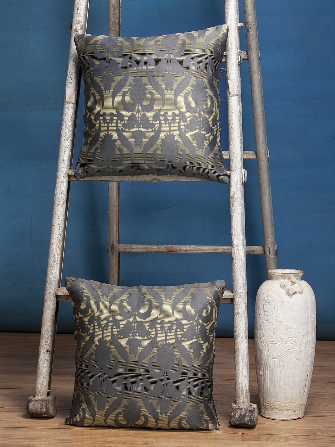 

Alina decor Set of 2 Grey & Gold-Coloured Ethnic Motifs Square Cushion Covers