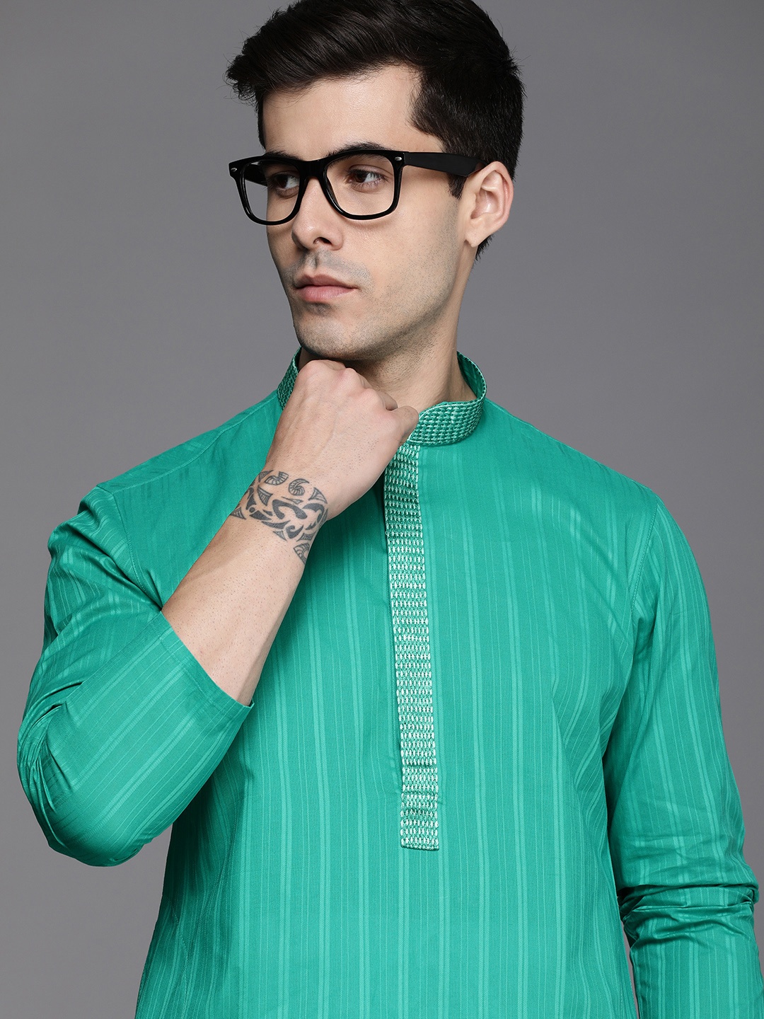 

Manyavar Men Green Striped Kurta with Pyjamas