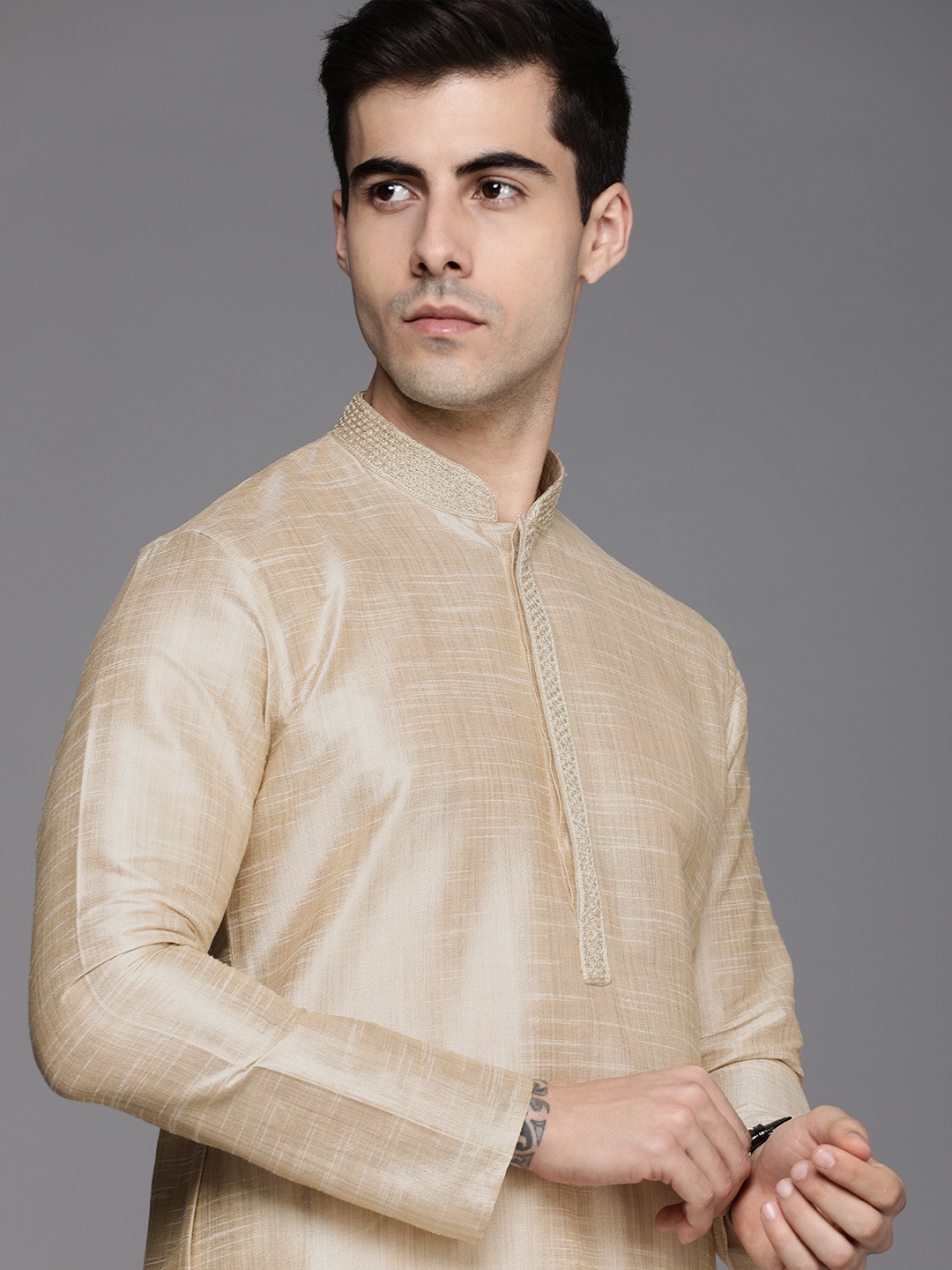 

Manyavar Men Beige Kurta with Churidar