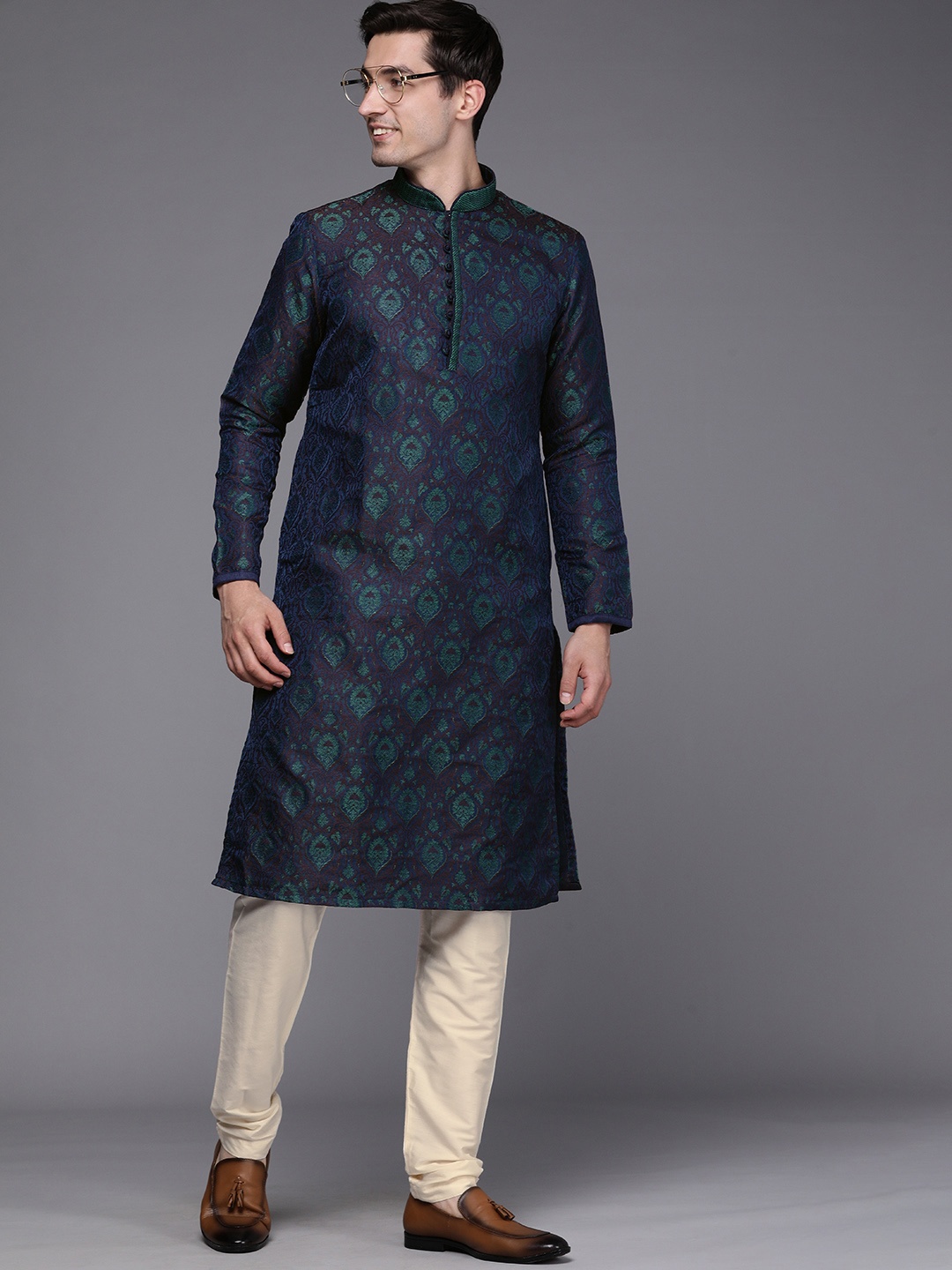 

Manyavar Men Blue Ethnic Motifs Self Design Kurta with Pyjamas