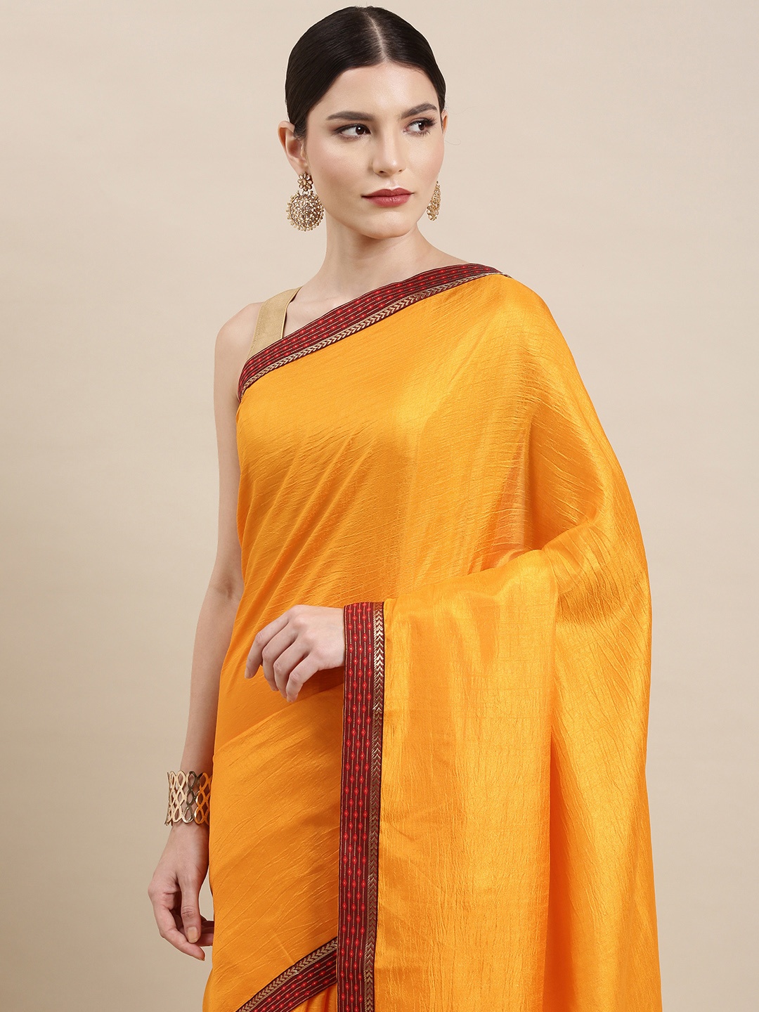 

Indian Women Yellow Solid Saree