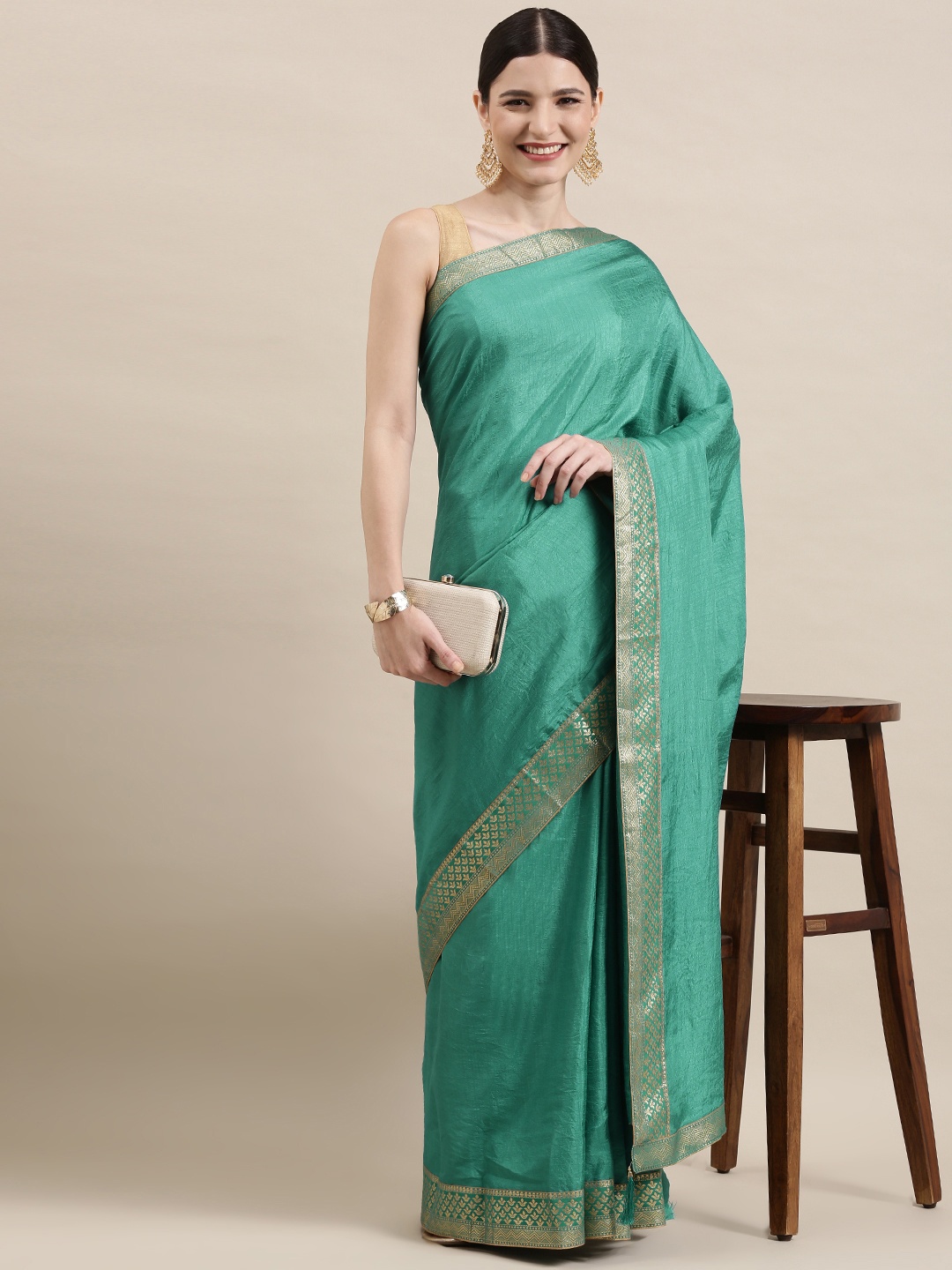 

Indian Women Teal Green & Silver Zari Silk Blend Saree