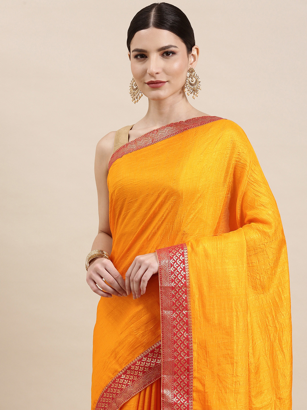 

Indian Women Mustard Yellow & Pink Zari Silk Blend Saree