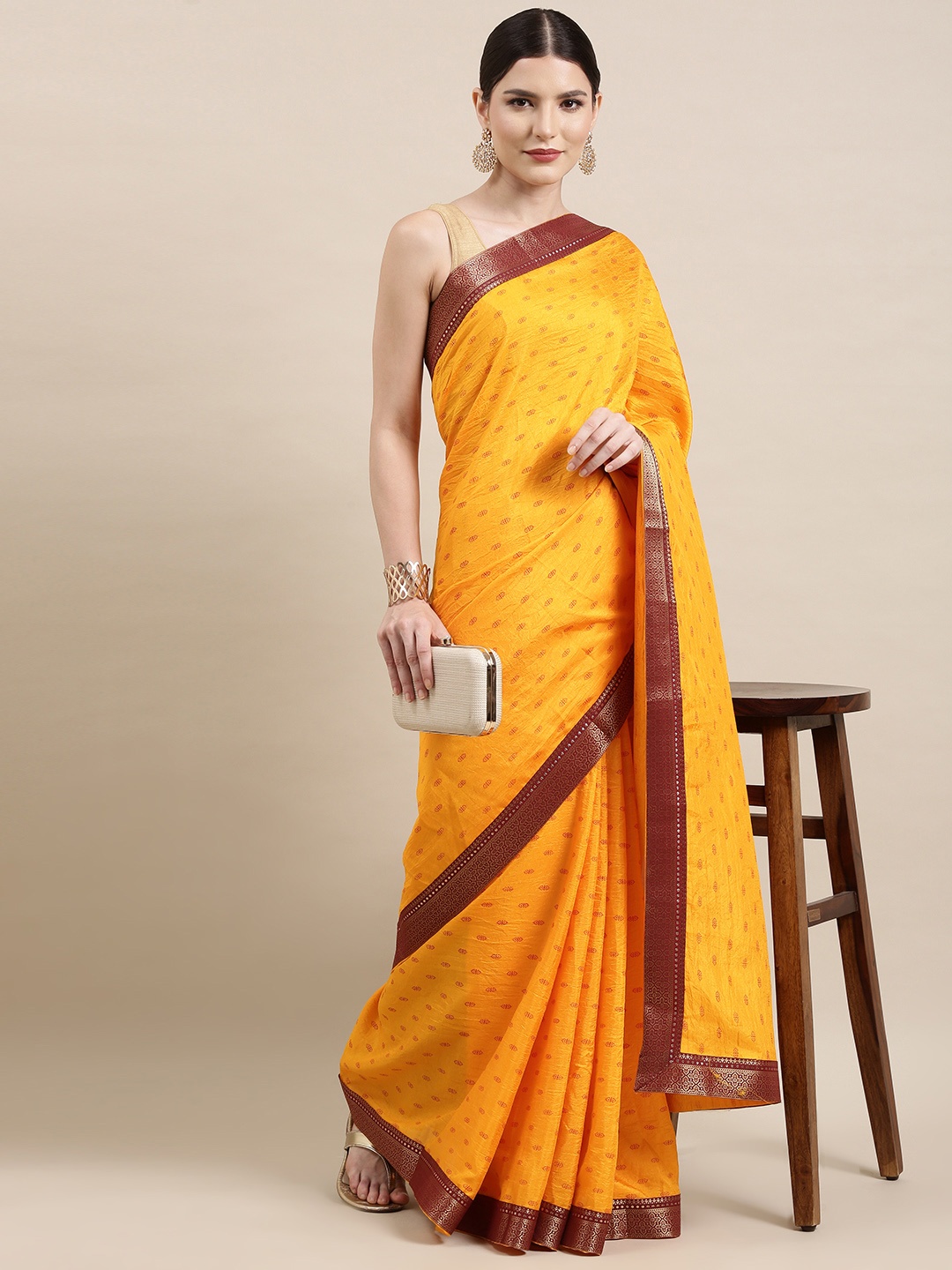 

Indian Women Mustard Yellow & Maroon Ethnic Motifs Zari Silk Blend Saree