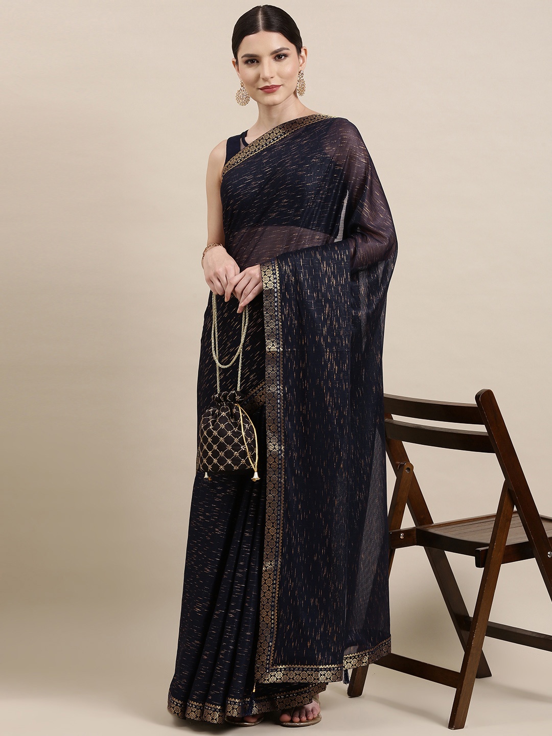 

Indian Women Navy Blue & Beige Striped Zari Silk Blend Saree