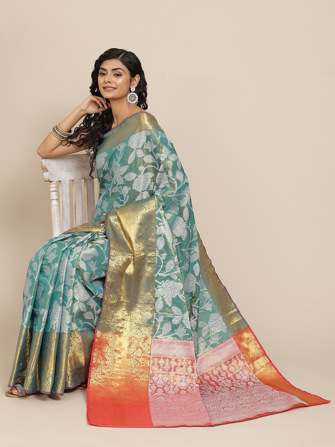 

Silk Land Teal Green & Coral Floral Zari Ikat Saree